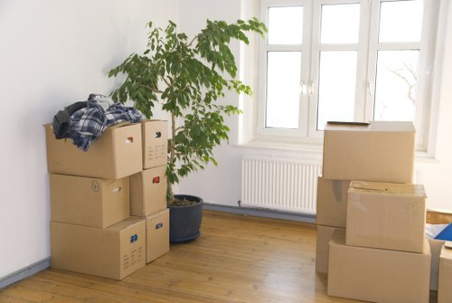 Packed boxes and furniture ready for a Kingston Vale house move