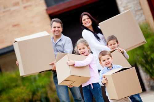Business relocation team handling desks and equipment