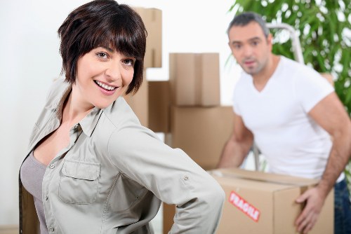 Professional removals van moving items across Kingston Vale and nearby areas