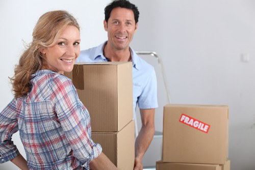 Staff using safe handling equipment during a move