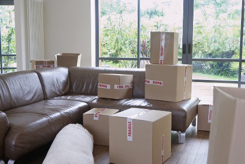 Furniture loading into a moving truck for a Kingston Vale relocation